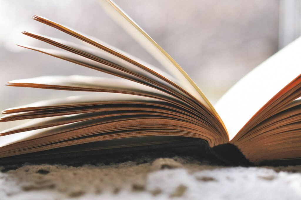 a book opened halfway through showing unwritten pages